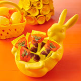 Broadway Basketeers Easter Basket Tower Premade Gift for adults, Kids, Boys, Girls - Includes Gourmet Chocolate, Candy, Easter Eggs a Great Easter