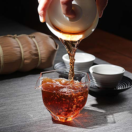 500g of ripe Pu 'er tea (5 pieces * 100g), 17.6oz tuocha wrapped in bamboo leaves