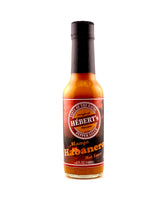 HÉBERT’s Mango & Habanero Hot Sauce is a sweet and spicy gourmet delight.