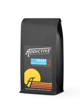 Addictive Coffee Roasters Steady Decaf - Whole Bean Coffee Medium/Dark Roast Columbia Blend With Hints of Cinnamon, Coconut & Hibiscus - 2lb Bag