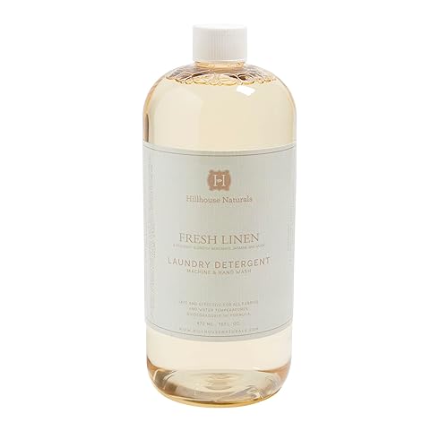 Hillhouse Naturals 32oz Fresh Linen laundry detergent. With scents of lemon and orange interwoven with bergamot, rose, jasmine and musk. Made in the