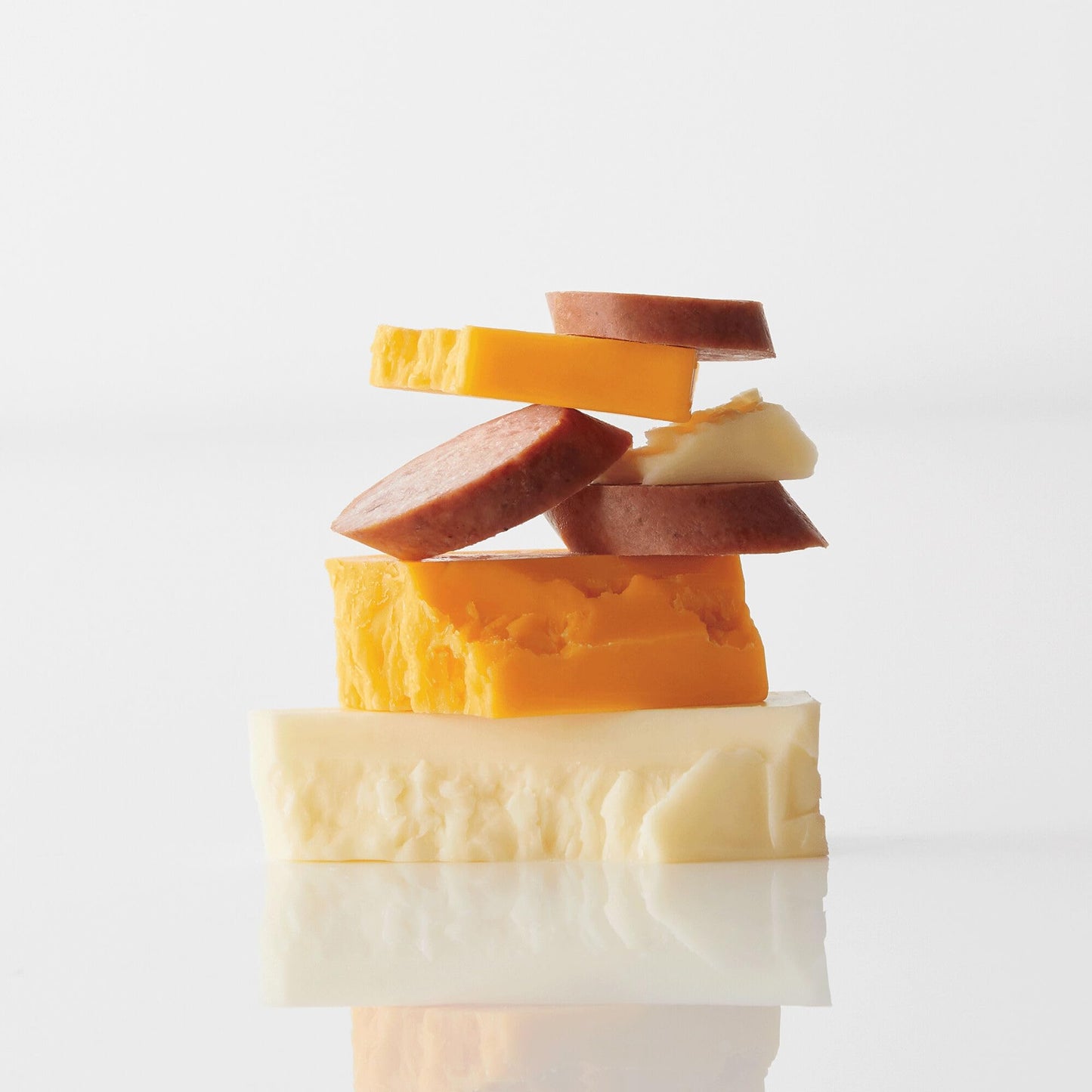 The Swiss Colony High 5 Food Bundle - Assorted Summer Sausages and Cheeses with Christmas Petits Fours - Assorted Chocolate and Mini Layer Cakes