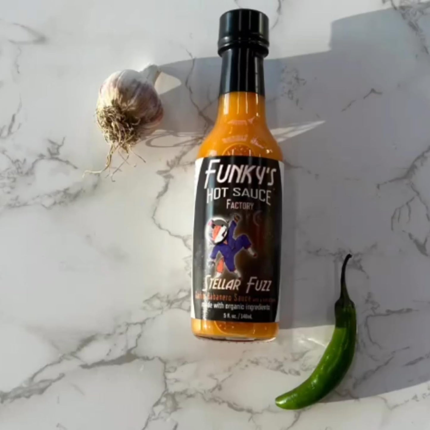 Heatonist Stellar Fuzz Hot Sauce by Funky's, Lingering Heat With Flavors Of Habanero, Savory Garlic & Ginger, Made With All Natural Ingredients, 5 fl