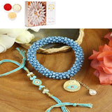 Ghasitaram Gifts Jaiccha Rakhi for Brother Rakhis Online - BRS25-024-Hand Woven Crystal Evil Eye Bracelet Bhaiya Bhabhi Rakhis with 400 gms of Kaju