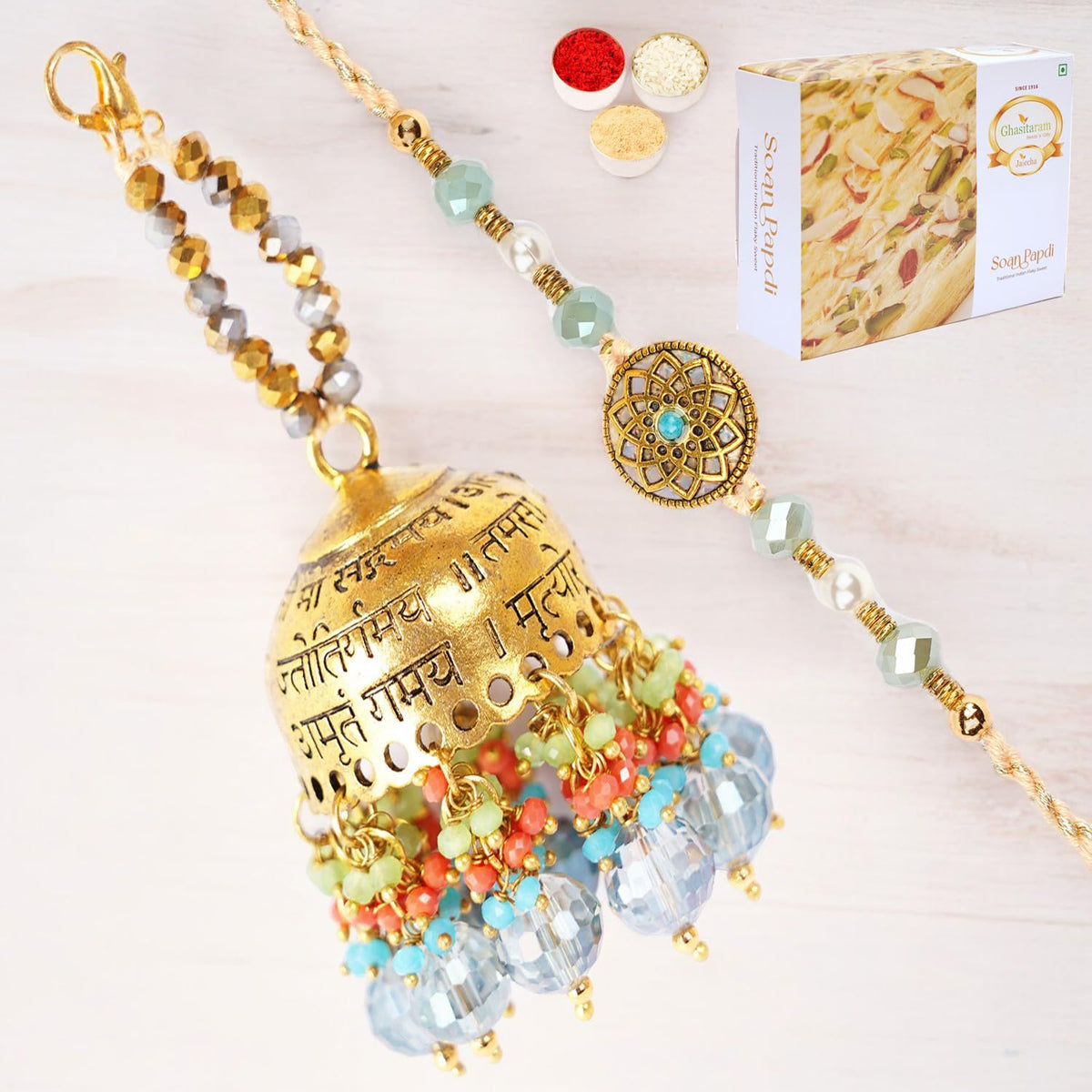 Ghasitaram Gifts Rakhis Online - Rakhi for Brother-RM-270 Bhaiya Bhabhi Rakhi with 200 GMS of Soan Papdi