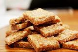 Gourmet Macadamia Brittle by Its Delish, 2 Lbs Bulk Bag | Handmade Old-Fashioned Style | Beautiful & Delicious Square Cut Pieces of Roasted Macadamia