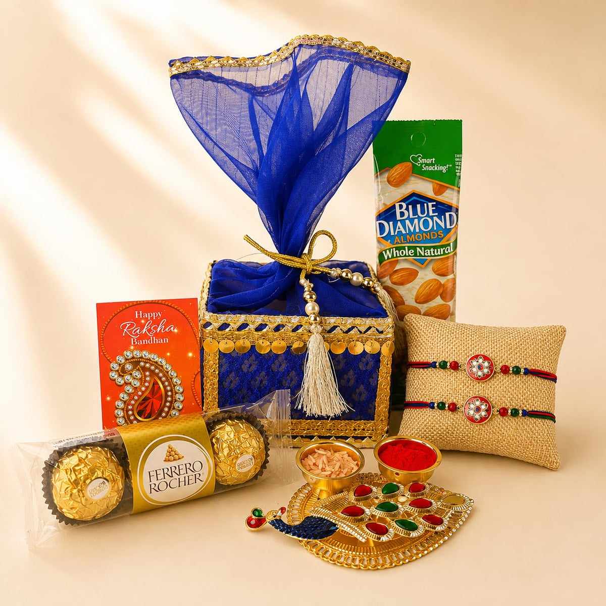 LOVENSPIRE Designer Rakhi Gift Hamper Set for Brother & Bhabhi - Includes 2 Rakhi Bracelet, Haldi Kumkum Holder, Chocolates, Roli Chawal & Gift Box