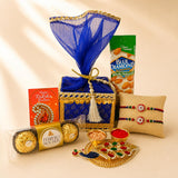 LOVENSPIRE Designer Rakhi Gift Hamper Set for Brother & Bhabhi - Includes 2 Rakhi Bracelet, Haldi Kumkum Holder, Chocolates, Roli Chawal & Gift Box