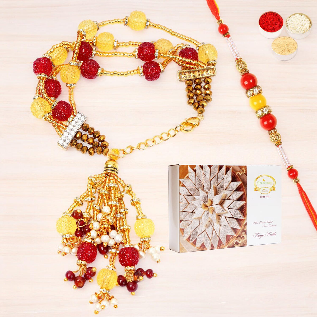 Ghasitaram Gifts Rakhis Online - Rakhi for Brother-RM-205 Bhaiya Bhabhi Rakhi with 200 GMS of Kaju katli