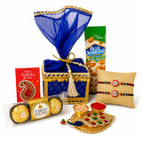 LOVENSPIRE Designer Rakhi Gift Hamper Set for Brother & Bhabhi - Includes 2 Rakhi Bracelet, Haldi Kumkum Holder, Chocolates, Roli Chawal & Gift Box