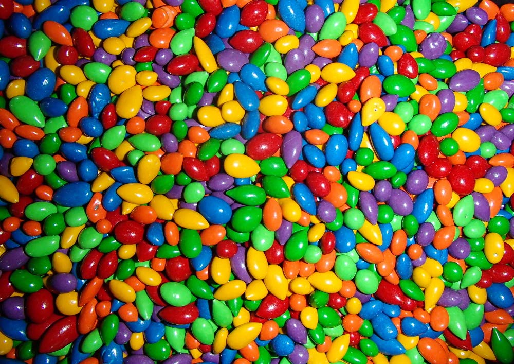 Sunbursts - Rainbow Colored Chocolate Covered Sunflower Seeds 1/2 Pound ( 8 Ounces )