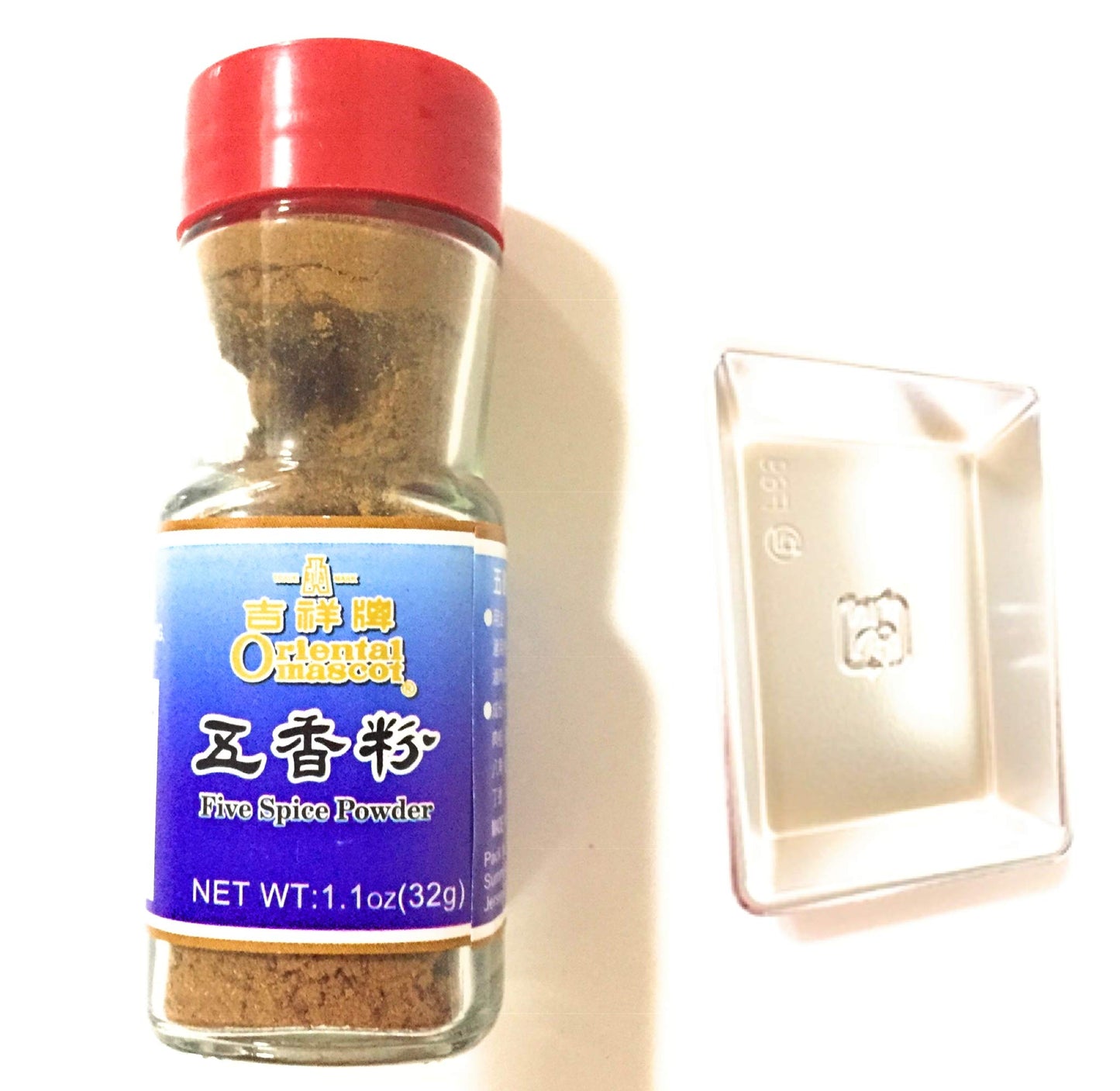 Oriental Mascot Five Spice Powder (1.1 oz) and one soy sauce dish