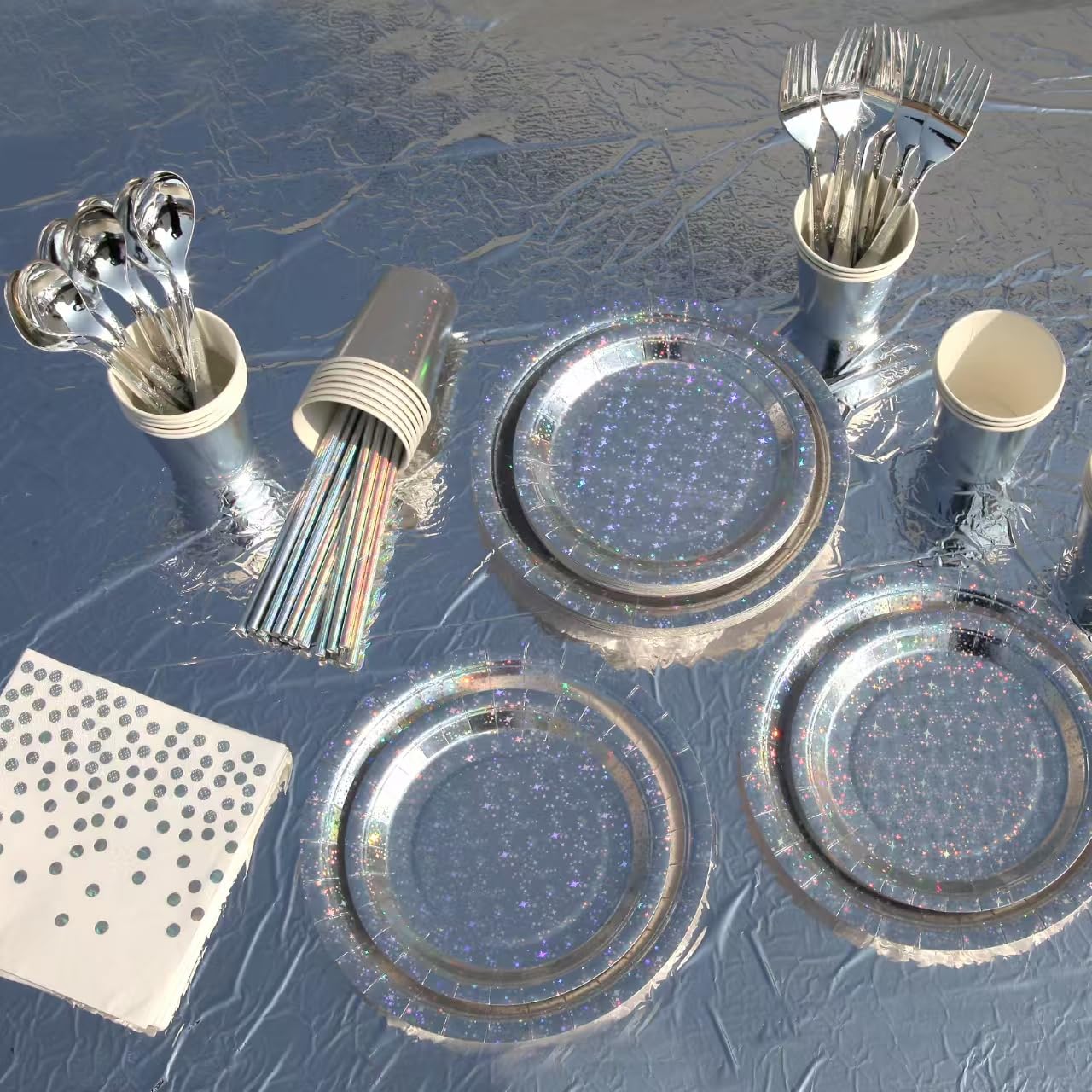 201-piece disposable party tableware set with paper plates, cups, napkins, straws, tablecloths, plastic knives, forks and spoons for a variety