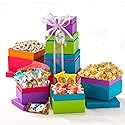 Broadway Basketeers Easter Basket Tower Premade Gift for adults, Kids, Boys, Girls - Includes Gourmet Chocolate, Candy, Easter Eggs a Great Easter