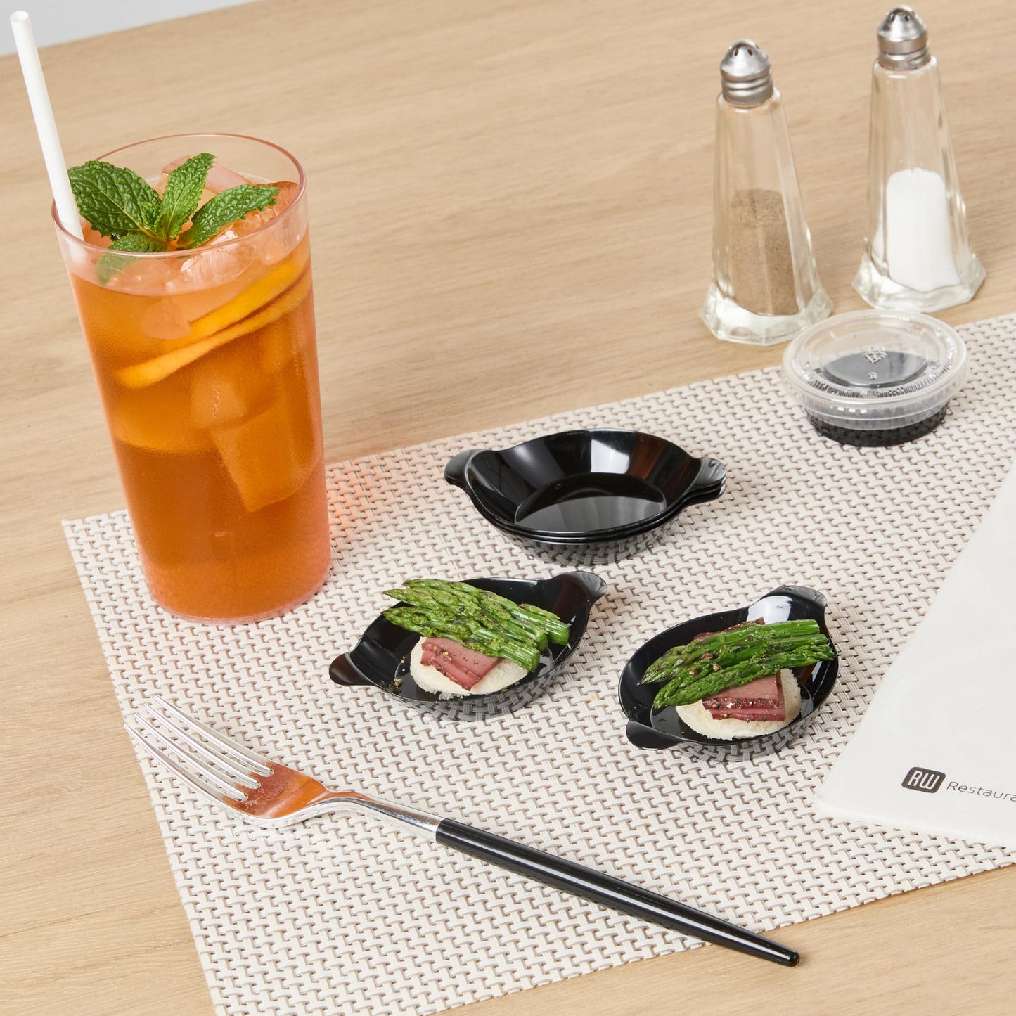 Restaurantware 3.8 x 2.5 Inch Mini Handled Plates 100 Durable Appetizer Plates - With Handles Disposable Black Plastic Handled Plates Suitable