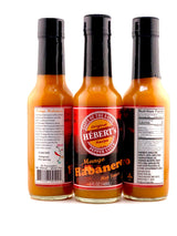 HÉBERT’s Mango & Habanero Hot Sauce is a sweet and spicy gourmet delight.