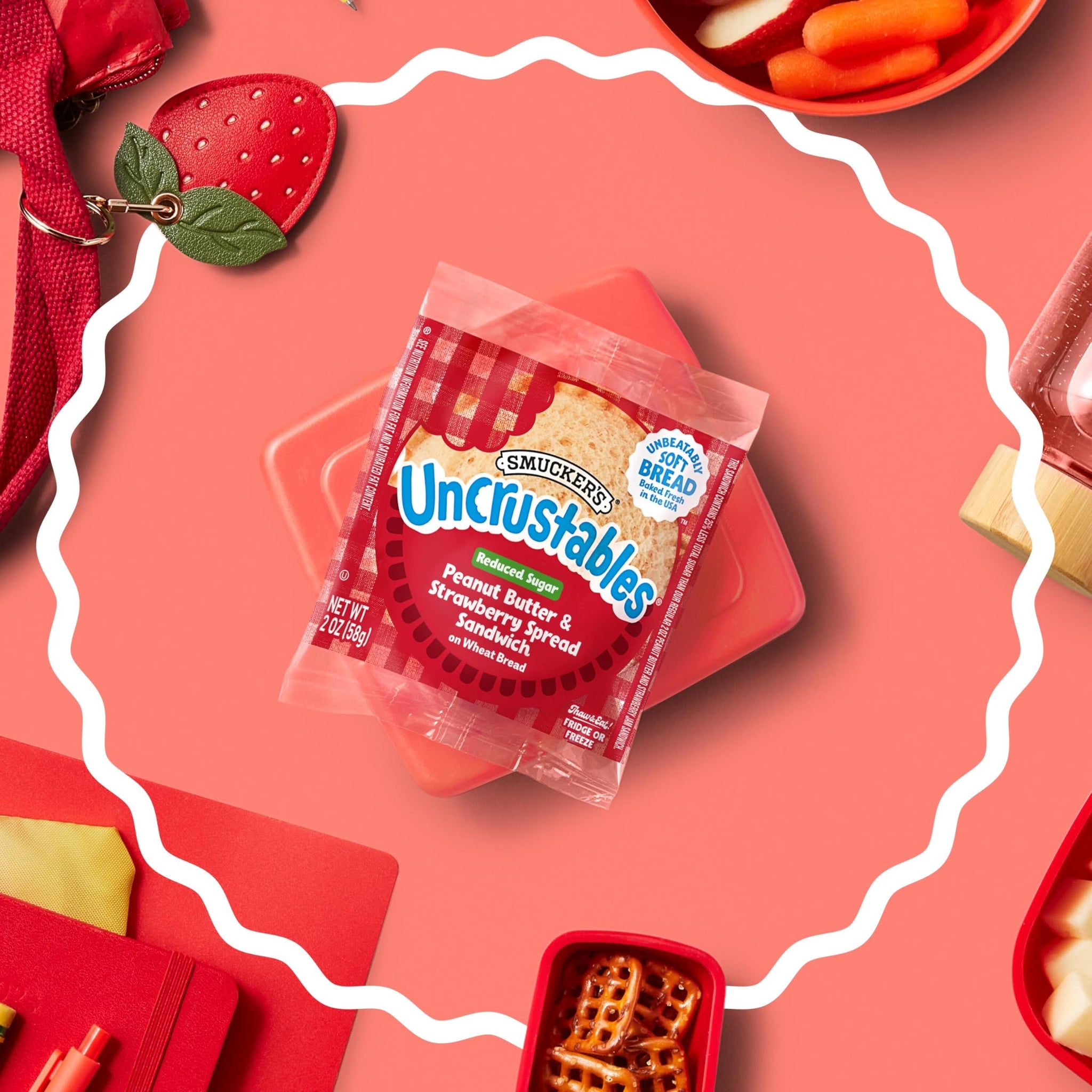 Smucker’s Uncrustables Reduced Sugar Peanut Butter & Strawberry Spread Sandwiches, 4 Count, 2 Oz. Each, Frozen