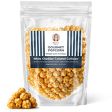 Renée’s White Cheddar Caramel Collision™ Connoisseur Popcorn™ - buttery caramel corn drenched in mellow Wisconsin white cheddar - satisfies sweet