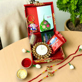 LOVENSPIRE Rakhi Gift Hamper for Brother 2PC Ganesha Rakhi with Candle Holder Ceramic Key Chain Roli Chawal Rakshabandhan Card Chocolates with Premium