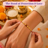 LOVENSPIRE Raksha Bandhan Gift Hamper for Brother and Bhabhi - Traditional Handmade Rudraksha Bead Rakhi Bracelet with Greeting Card & Roli Chawal