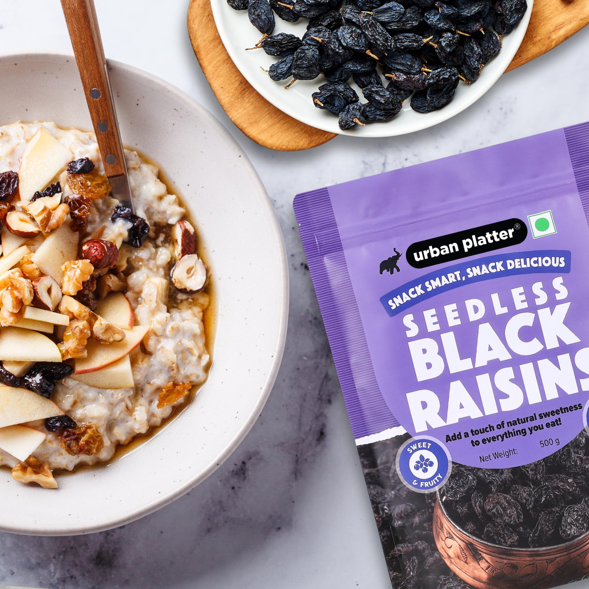 Urban Platter Seedless Black Raisins, 500g