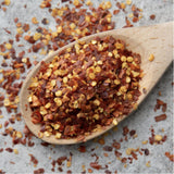 Crushed Red Pepper Flakes 0.2oz - 50 Pack. Bold, spicy flavor perfect for pizza, pasta, chowder, seafood, and more. Individually packed for freshness