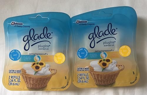 4 GLADE PLUGINS SCENTED OIL REFILLS 2 CLEAN LINEN / 2 SUNNY DAYS SEALED PACKS