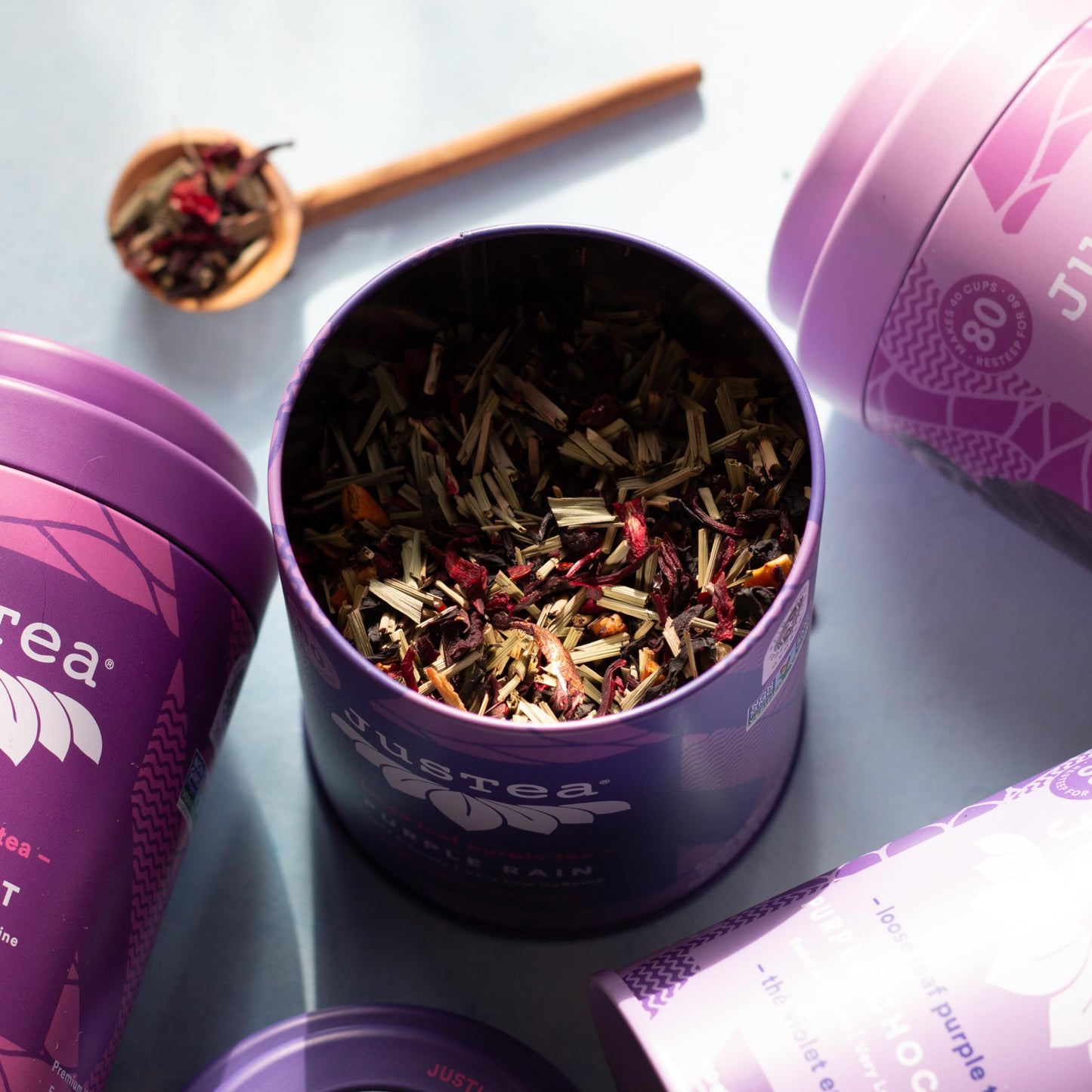 JusTea PURPLE RAIN | Loose Leaf Purple Tea | Tin with Hand Carved Tea Spoon | 40+ Cups (2.8oz) | Very Low Caffeine | Award-Winning | Fair Trade |