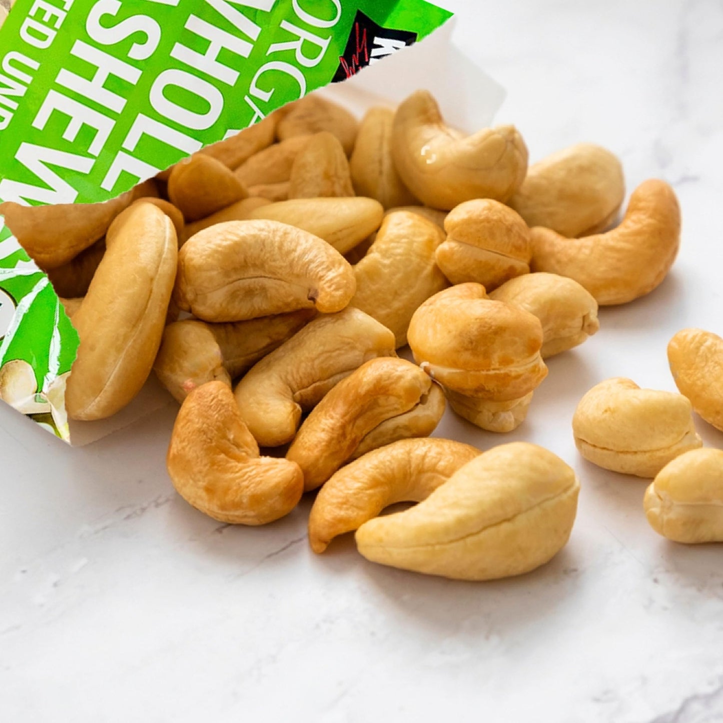 Worldwide Nutrition Bundle: Kirkland Signature Organic Whole Cashews Unsalted Unroasted - Perfect for Snacking, Cooking, and Gifting - 40 Ounce Cashew