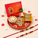 LOVENSPIRE Peacock Rakhi Gift Hamper Set for Brother & Bhabhi - Includes 2 Rakhi Bracelet, Decorative Puja Plate, Chocolates & Roli Chawal Peacock