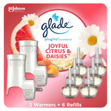 Glade PlugIns Refills Air Freshener Starter Kit, Scented and Essential Oils for Home and Bathroom, Joyful Citrus & Daisies 4.02 Fl Oz, 2 Warmers + 6