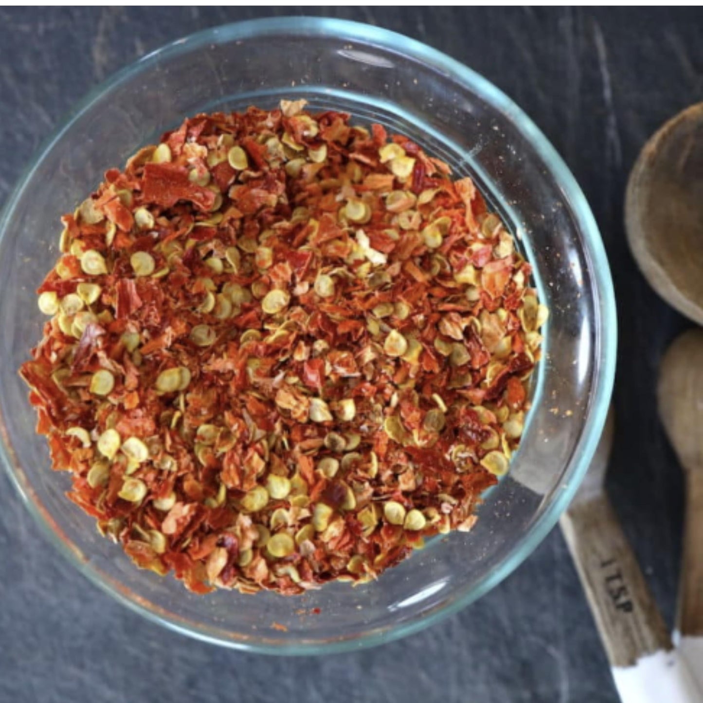 Crushed Red Pepper Flakes 0.2oz - 50 Pack. Bold, spicy flavor perfect for pizza, pasta, chowder, seafood, and more. Individually packed for freshness