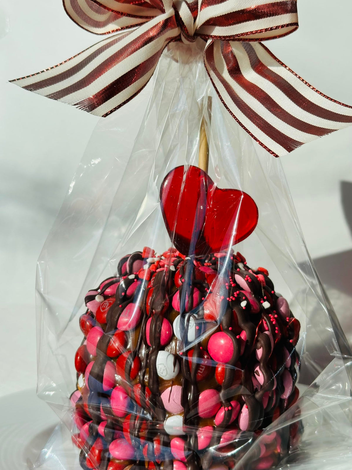 Valentines Day Gourmet Caramel Apple with Candy Buttons and Dark Chocolate
