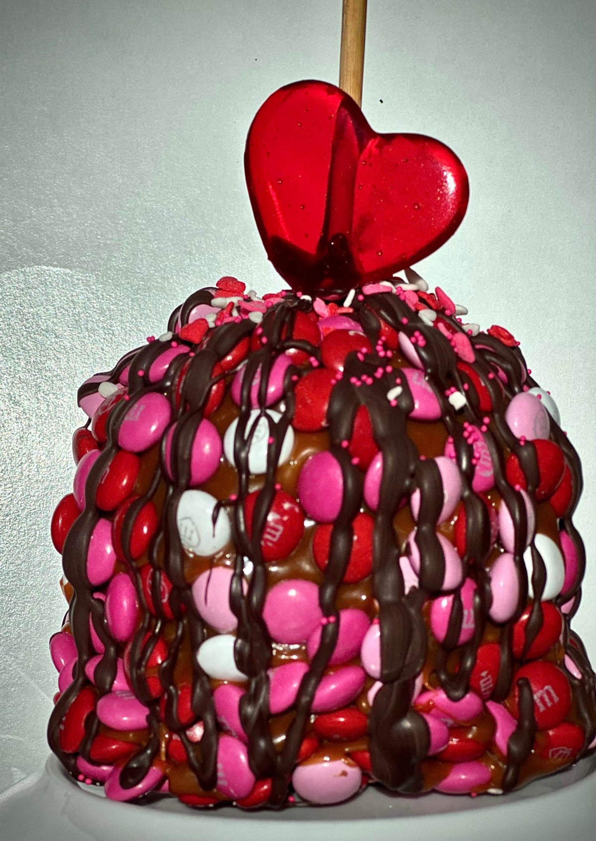 Valentines Day Gourmet Caramel Apple with Candy Buttons and Dark Chocolate