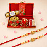 LoveNspire Brocade Raksha Bandhan Gift Hamper for Brother & Bhabhi - Includes 2 Designer Rakhis, Chocolate Pack, Candle Holder, Haldi Kumkum Holder