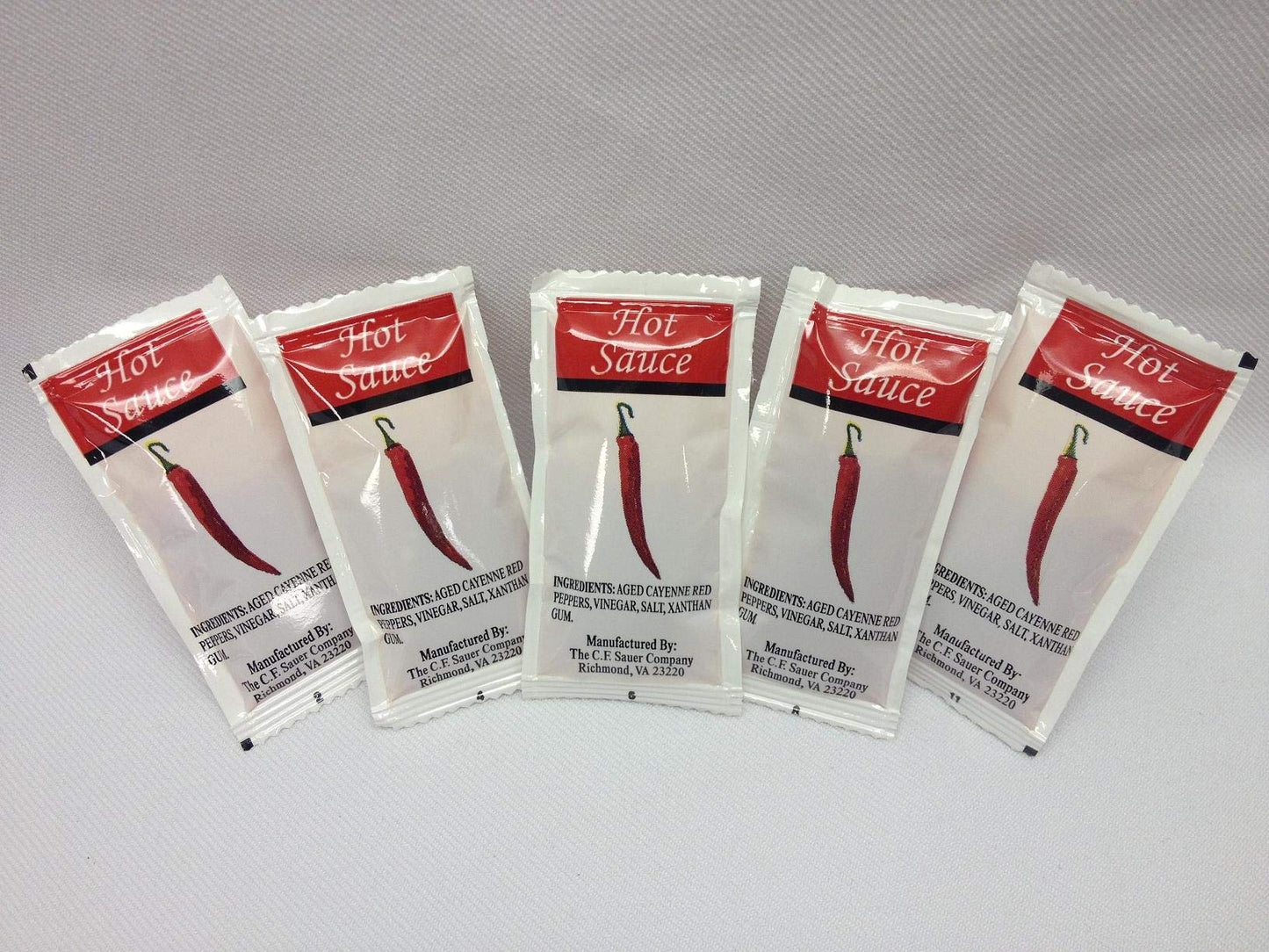Commodity Dressing Hot Sauce, 7 Gram -- 200 per case.