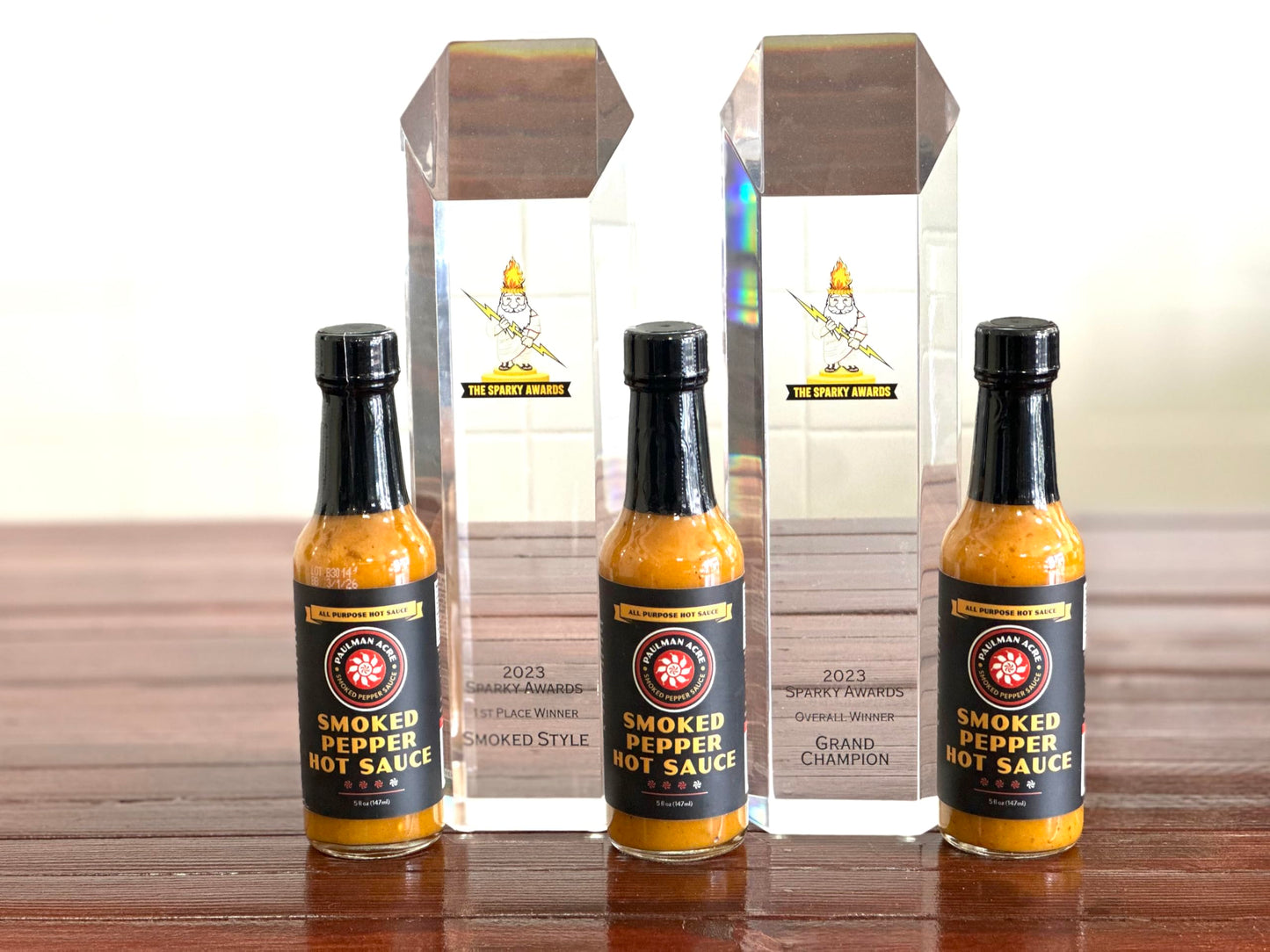 Paulman Acre: Smoked Pepper Hot Sauce (5floz) Apple Smoked Habaneros with Pineapple, Mango and Papaya
