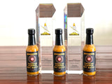 Paulman Acre: Smoked Pepper Hot Sauce (5floz) Apple Smoked Habaneros with Pineapple, Mango and Papaya