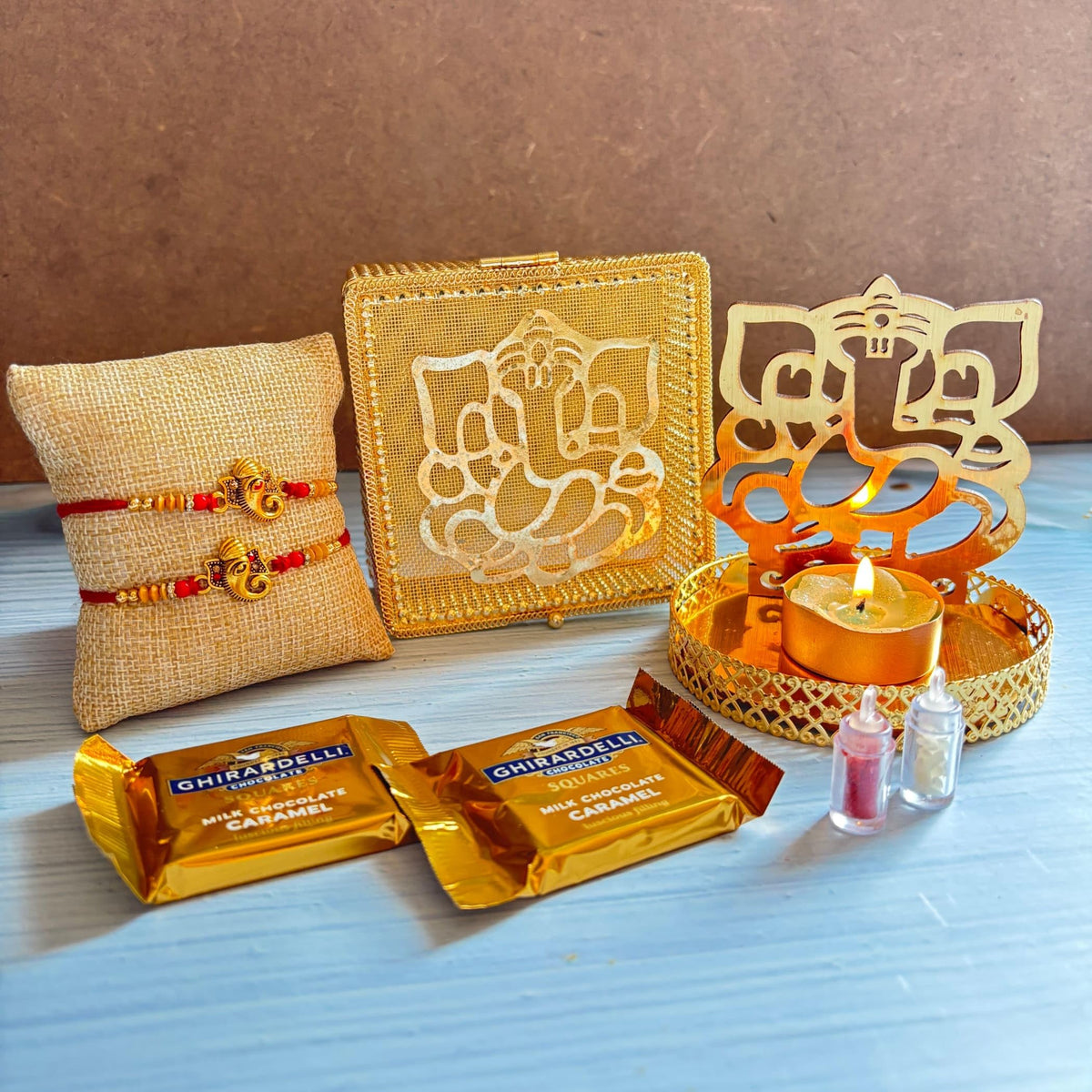 LoveNspire Raksha Bandhan Premium Gift Hamper for Brother & Bhabhi - Designer Rakhi Bracelet Set with Elegant Gift Box, Chocolates, & Roli Chawal