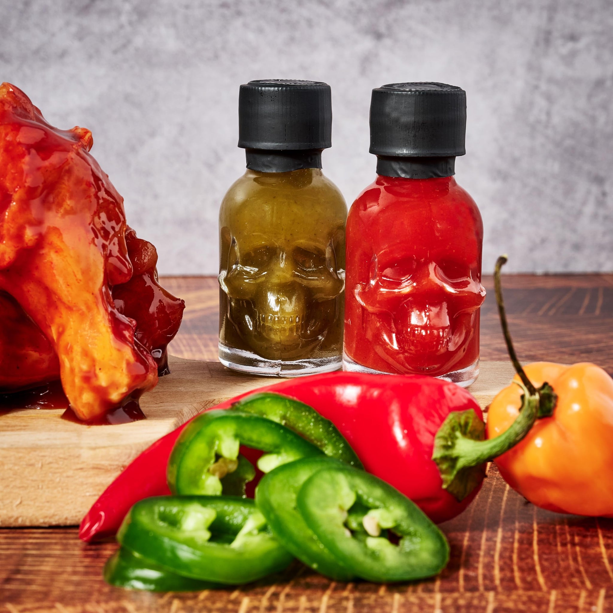 Man Crates, Hot Sauce Inferno Flight, Includes 21 Flavors in Skull-Shaped Mini Hot Sauce Bottles, Spicy Challenge with Habanero, Ghost Pepper & More