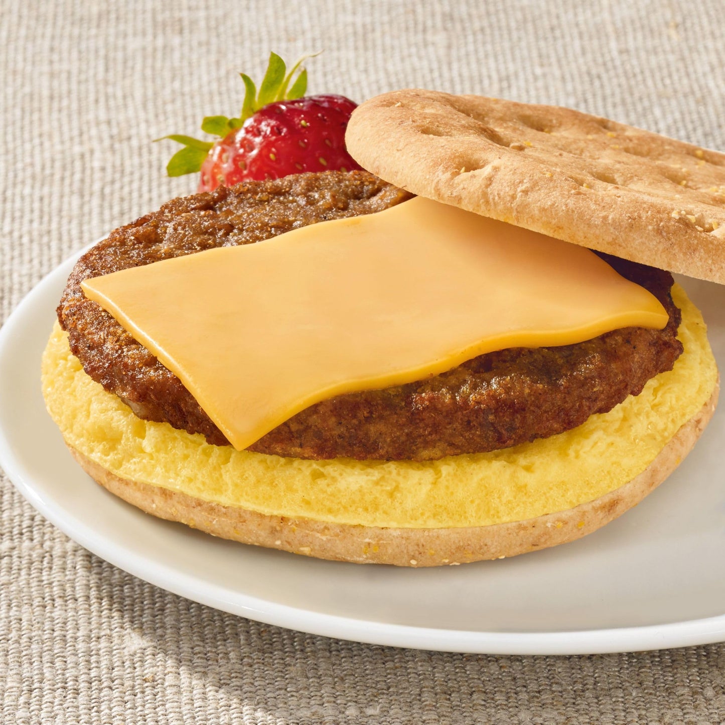 MorningStar Farms Veggie Breakfast Sandwich, Plant Based, Frozen Breakfast, Meatless Sausage Egg and Cheese, 14.8oz Box (4 Patties)