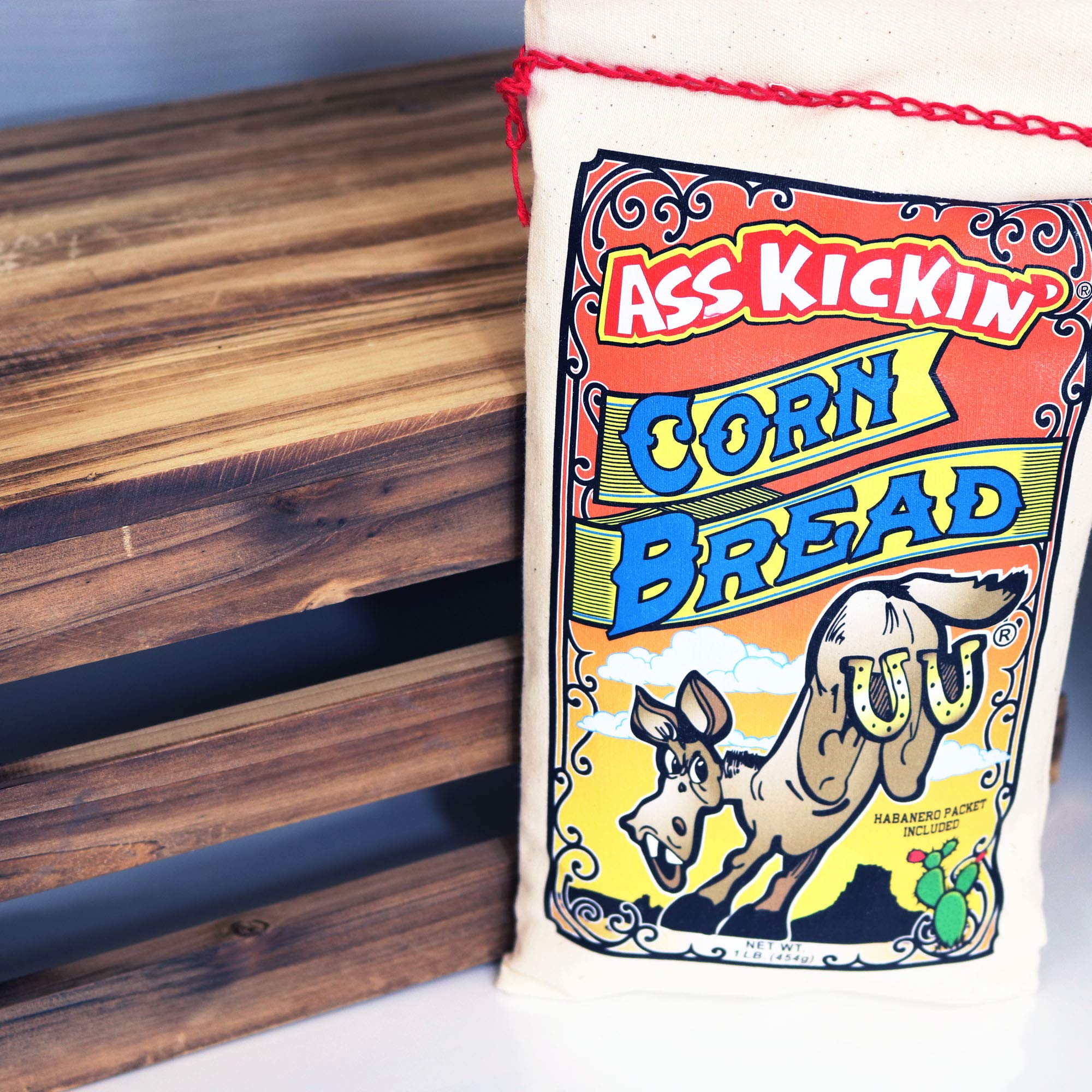 Ass Kickin' Corn Bread - A full flavor bread mix which includes a packet of habanero pepper so you can flavor to taste. Packed in a canvas bag. by Southwest Specialty Food