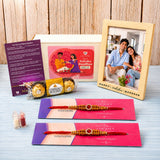 LOVENSPIRE Designer Rakhi Gift Hamper for Brother & Bhabhi - Adjustable Rakhi Bracelet with Customizable Photo Frame, Chocolates, Roli Chawal & Card
