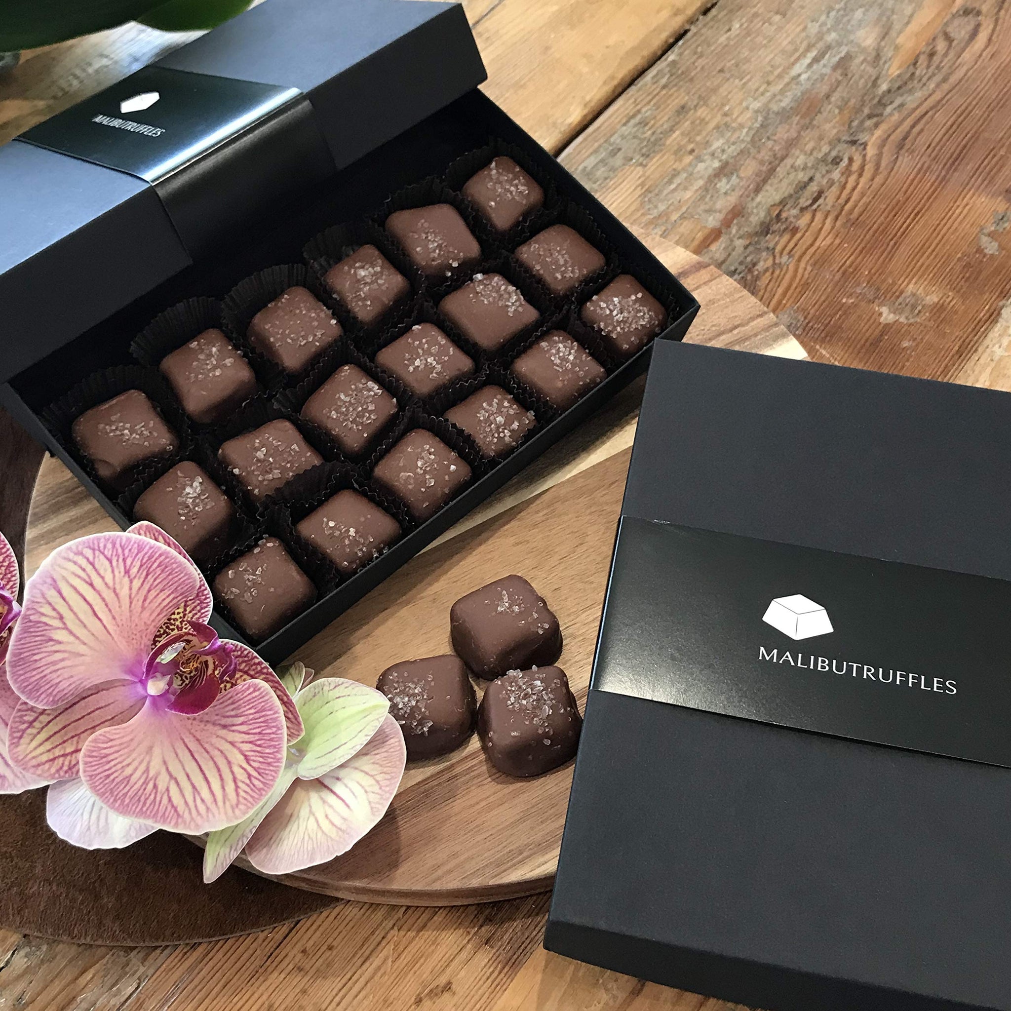 1 lb fancy candy box of gourmet Sea Salt Caramels. Each candy is hand dipped in Dark Chocolate an topped with Sea Salt. A chewy, smooth, and creamy
