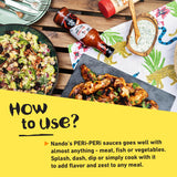 Nando's Hot PERi-PERi Sauce - Hot Heat Fiesty Blend of Garlic & Herbs - Great Substitute for Siracha | Gluten Free | Non GMO | Kosher - 9.1 oz Bottle