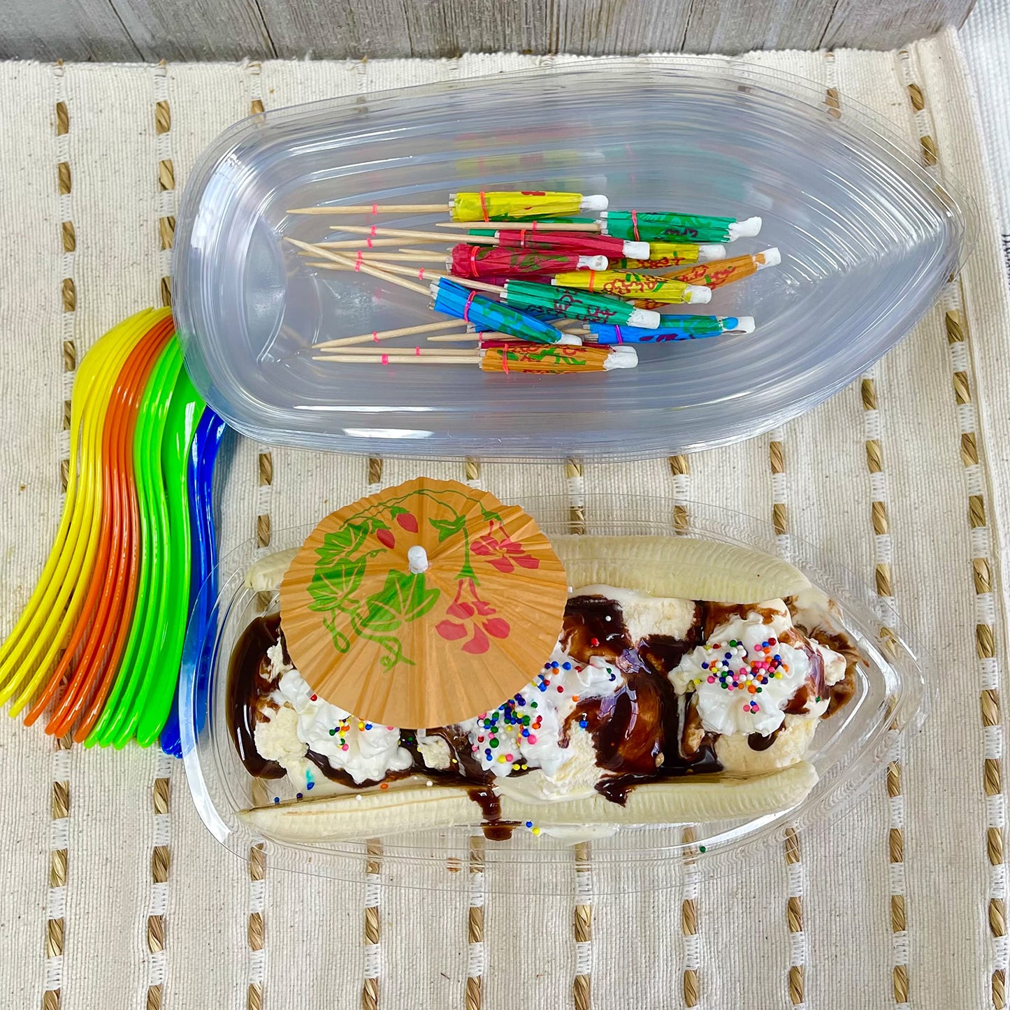 Outside the Box Papers Clear Plastic Banana Split Boats 12 oz.Disposable Dish - Paper Umbrellas - Eco Friendly Plastic Spoons- 16 Each