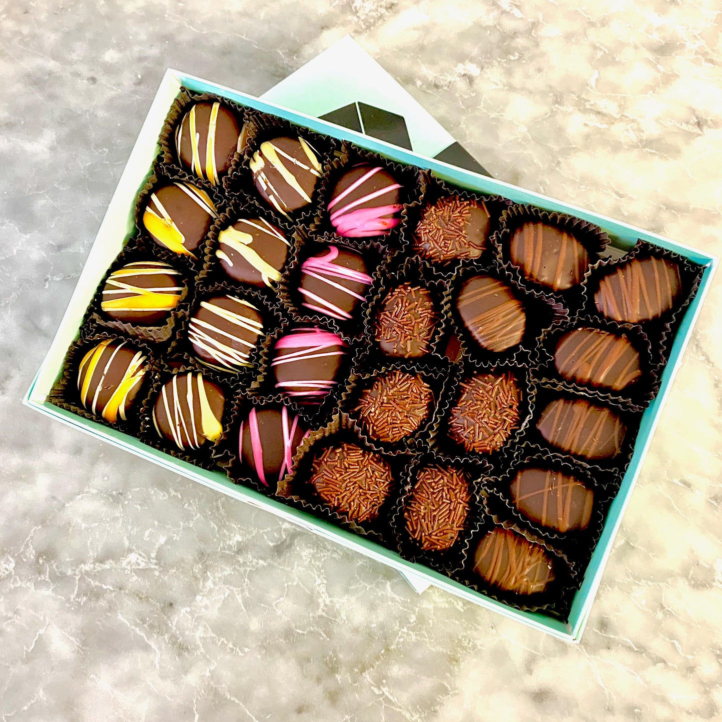 Gourmet Chocolate Candies and Wine Accessory Gift Box. 1 lb of Dark Chocolate Gourmet Truffle Cream Candies, a Whale Aerator and Pourer, two Etched