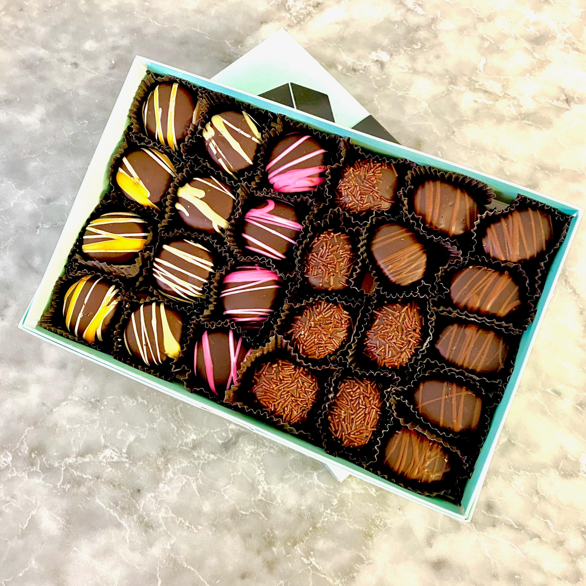 Gourmet Chocolate Candies and Wine Accessory Gift Box. 1 lb of Dark Chocolate Gourmet Truffle Cream Candies, a Whale Aerator and Pourer, two Etched