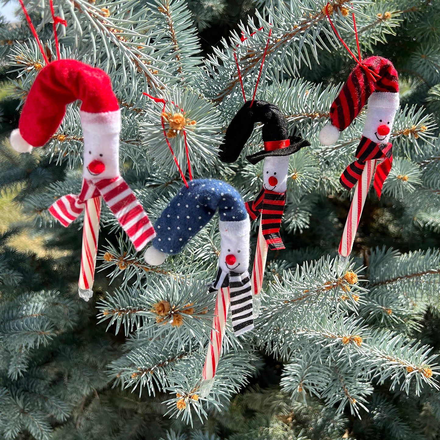 Podzly 12 Pack Snowman Candy Cane Cover Sleeves - Christmas Tree Ornament Toppers for Home, Classroom & Office - Ideal for Holiday Parties & Student